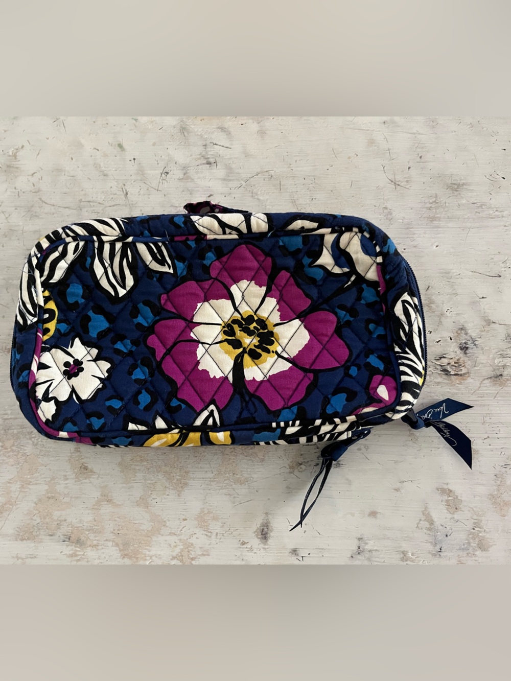 Vera Bradley quilted cosmetic pouch features the retired African Violet floral